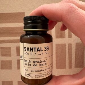Le Labo Santal 33 Bath Grains in Brown Bottle